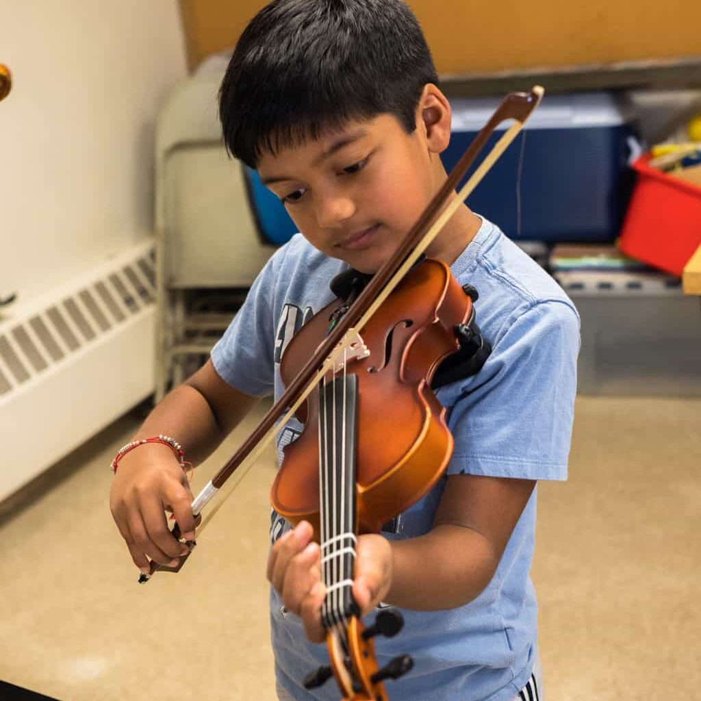 Student enjoying violin practice