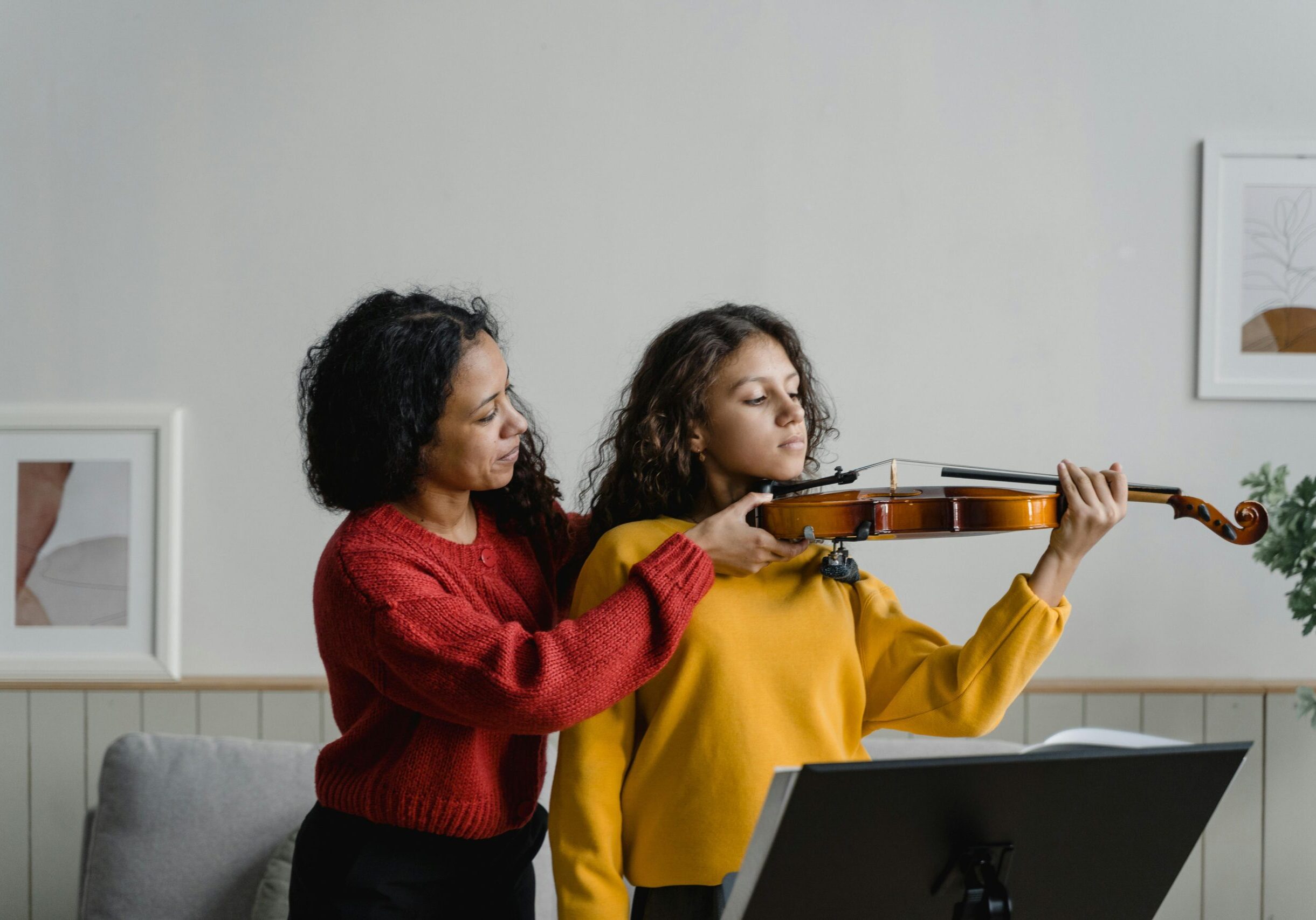violin lesson girl and teacher Violin Lessons at Maestro Musicians